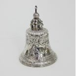 A Russian silver table bell in the form of The Tsar's Bell in Moscow with orb and cross surmount,