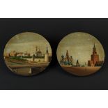 A pair of Russian lacquer plates, Vichnyakov circa 1880, painted with scenes of St Basil's,