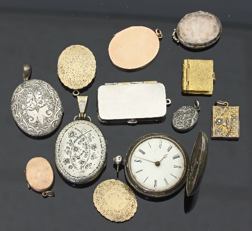 A silver hunter pocket watch and a quantity of silver and other oval lockets