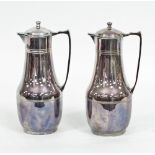 A pair of plated Thermos jugs with hinged covers,