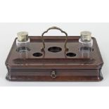 An 18th Century walnut inkstand, rectangular with indented corners and loop handle,