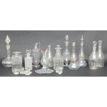 A collection of twelve glass decanters, carafes and stoppers/Provenance: Plas Gwyn,