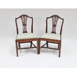 A pair of mahogany pierced splat-back single chairs,
