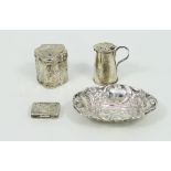 A silver miniature jug with pierced cover, Chester 1897, 4cm high,