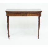 A mahogany D-shaped tea table on turned tapering legs