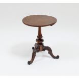 A circular pollard oak table top on a Victorian turned, reeded column and tripod support,