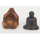 A Chinese carved wooden figure of Buddha, 5cm high and another, signed,