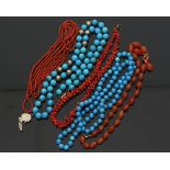 A branch coral necklace, two coral bead necklaces,