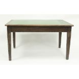 An oak kitchen table with end drawers on square tapering legs, 137cm long and a large trunk,