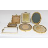 A quantity of sundry pictures and frames to include a pair of gilt moulded oval frames