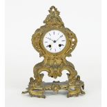 A 19th Century French ormolu mounted clock with enamel dial, silk suspension and striking on a bell,