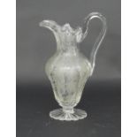 A fine cut glass jug, 19th Century, cut and engraved with vines, 30cm high/Provenance: Plas Gwyn,