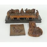 A carved wood scene of the Last Supper,