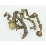 A brass door handle, a large brass door knob and various brass lock chains etc.