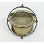 A ship's brass compass by C Butterfield and Company, London,