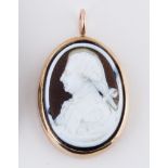 A glass cameo depicting a gentleman in profile,