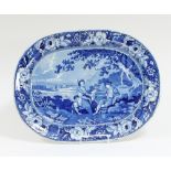 A Longport blue and white dish transfer printed a shepherd, companion, child and sheep with lake and