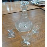 A triple ring neck decanter with mushroom stopper,