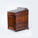 A 19th Century rosewood Davenport writing desk, circa 1830, 58cm wide/Provenance: Plas Gwyn,