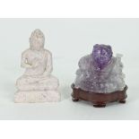 A Chinese limestone carved figure of Buddha, 8cm high and a carved amethyst figure of Buddha,