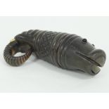 A 19th Century horn whistle topped snuff box, carved a hippopotamus to one end and an elephant to