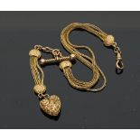 A lady's late Victorian 9ct gold fob chain, suspending a heart shaped fob, approximately 14gm