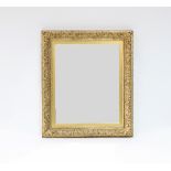 A carved giltwood wall mirror,