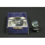 A crystal ball, 5cm diameter in a box by Two Worlds Ltd, 18 Corporation St,