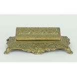 A cast brass stamp box, 22cm wide and a coppered Art Nouveau pen tray,