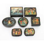 A group of seven Russian Palekh boxes, comprising two large rectangular examples, largest 10cm wide,