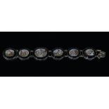 An Italian micromosaic bracelet, the six oval panels depicting various views of Rome,