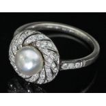 A natural pearl and diamond ring, the central pearl to a pierced surround of diamond set spirals,