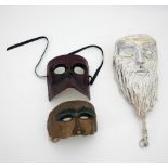 Three papier mâché theatre masks, one Venetian, signed A G, S Ralto,