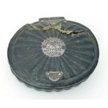 A horn snuff box, the lid with silver plaque dated 1710,