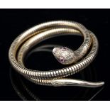 A 9ct gold articulated snake bangle, with ruby set eyes, approximately 28.