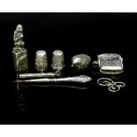 A novelty silver sealing wax holder, A J S, Chester 1913, modelled as a monkey with gem set eyes,