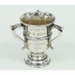 A miniature silver trophy of tyg form, Walker & Hall, Birmingham 1907,