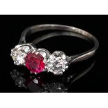 A ruby and diamond three-stone ring,