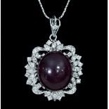 A ruby and diamond pendant,