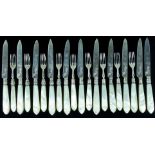 A part set of silver and mother-of-pearl handled fruit knives and forks,