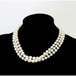 A three-row cultured pearl necklace,