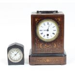 A Victorian marquetry mantel clock, the enamel dial marked Leroy à Paris, within a rosewood,