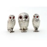 A Victorian novelty silver condiment set of owl form,