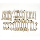 A collection of silver cutlery, fiddle and thread pattern, comprising seven table spoons 1865-1877,