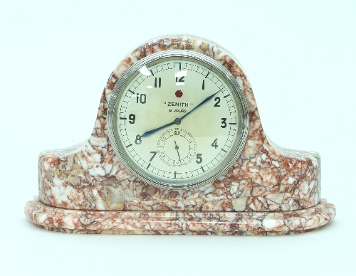 An Art Deco Zenith eight-day mantel clock, in a veined red marble case,