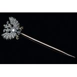 A Russian gem set stick pin, with double-headed eagle terminal,