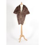 A lady's fur cape and two fur stoles