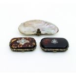 A 19th Century oyster-shell purse, 12cm wide and two tortoiseshell cased purses,