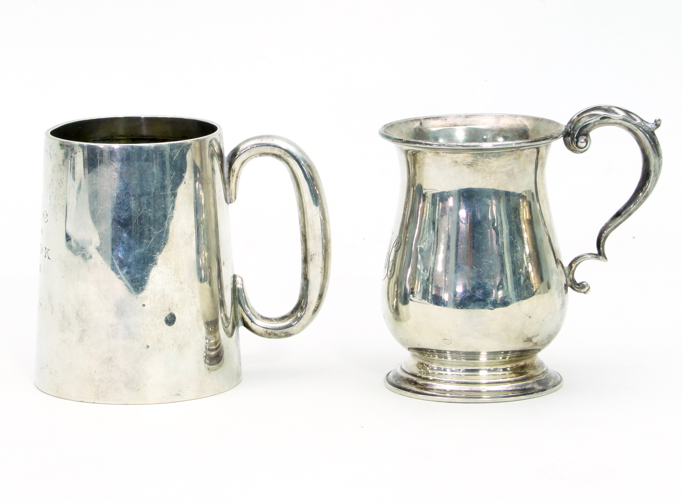 A silver half pint baluster mug, Birmingham 1908, approximately 100gm, and another tapering mug,
