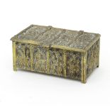 An embossed brass box, the front, back,